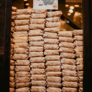 Stack of packed goods in a storefront, ideal for sales and promotions concepts.