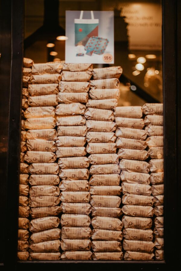 Stack of packed goods in a storefront, ideal for sales and promotions concepts.